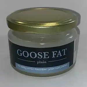 Glass jar of plain goose fat with a gold screw lid