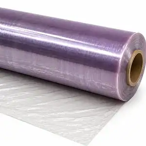 Roll of clear meat wrapping film on a cardboard core, partly unrolled