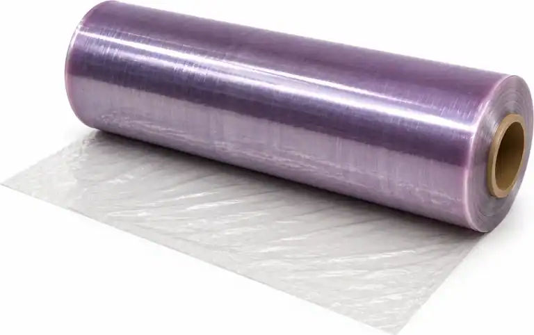 Roll of clear meat wrapping film on a cardboard core, partly unrolled