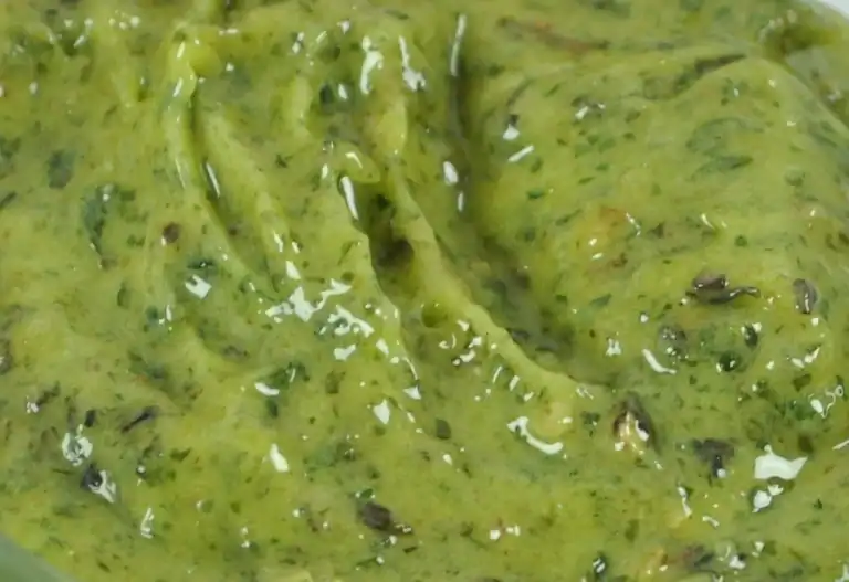 Close-up of RAPS Kiev marinade, a thick green garlic and herb paste