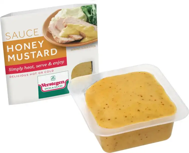 Verstegen Honey Mustard sauce in a clear microwave tub beside its carton